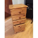 *A pine chest of five drawers.