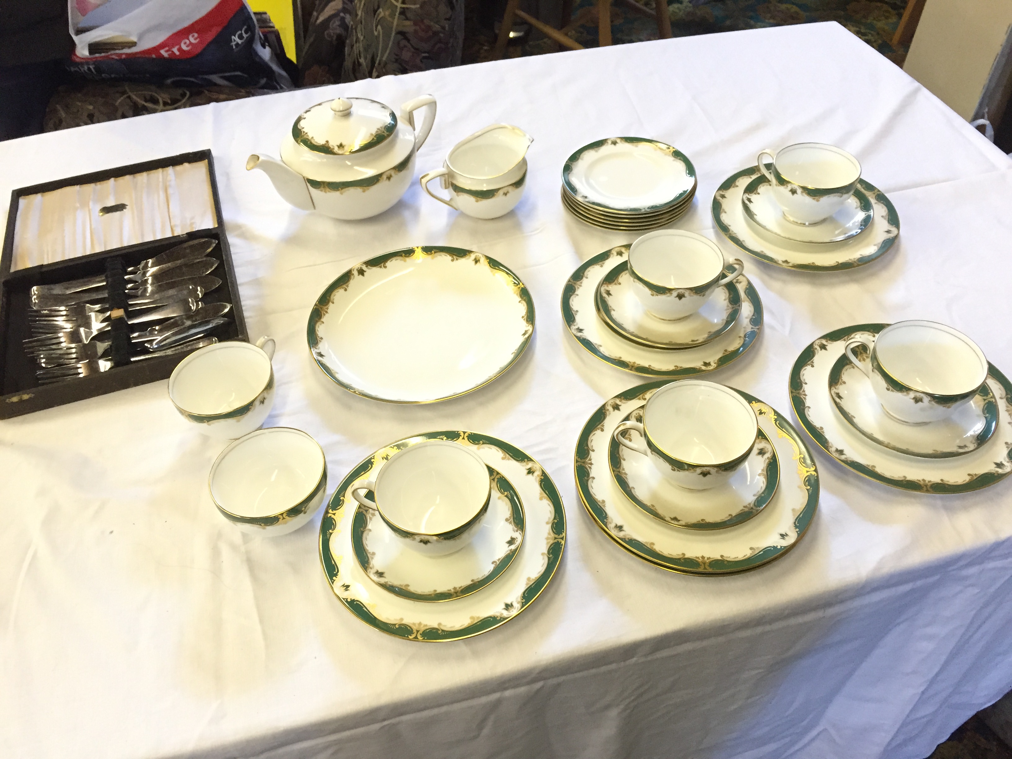 A part tea set and a set of boxed fish cutlery.