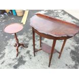 A small wine table and a half round hall table.