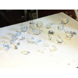 A selection of Swarovski crystal some with damage.