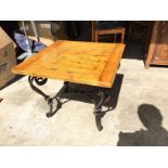 *A metal frame and timber topped coffee table.