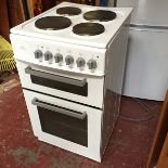 *A new World electric cooker.