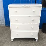 A pine four drawer painted chest of drawers.