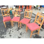 Four pine chairs.