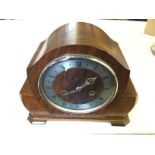 A chiming mantle clock.