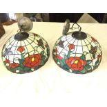 Three Tiffany style lamp shades.