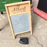 An Albert washboard and an iron.