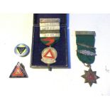 A group of driving medals one stirring silver 1937 to 1934 A 10 years safe driving 5 years safe