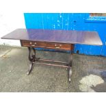 A mahogany side table.