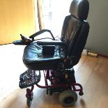 *An electric wheelchair.