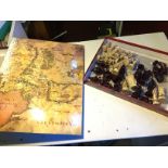 A Lord of the Rings chess set.