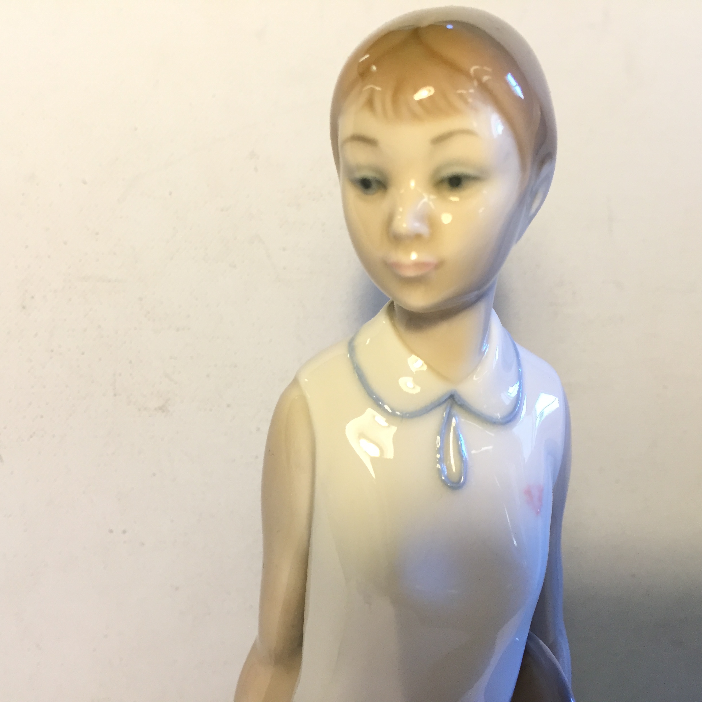 A Lladro figurine of a girl playing in a tennis outfit. - Image 6 of 6