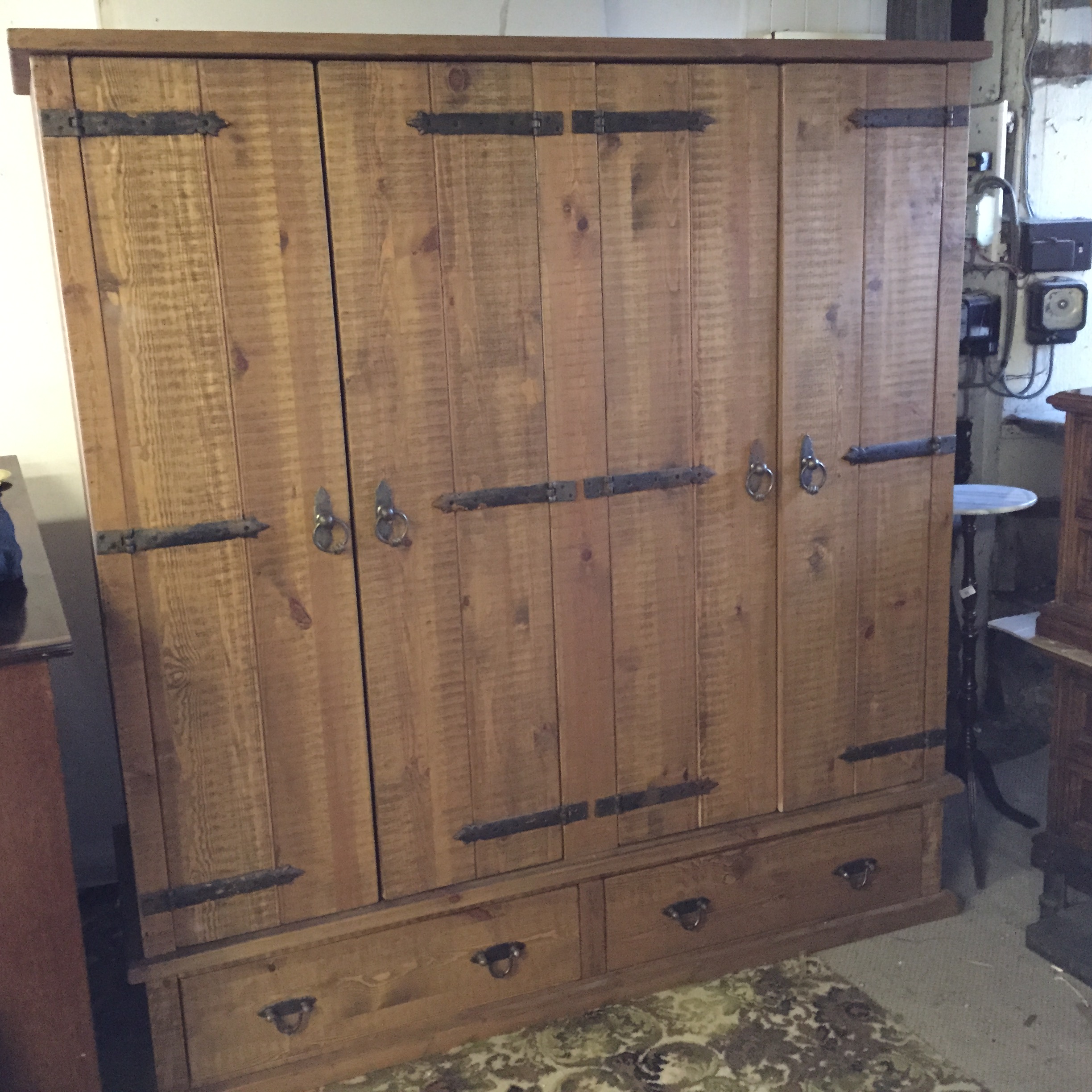 A very large pine triple wardrobe with two drawers below. ( cost new £ 2200) 1800 mm w by 1900 mm h