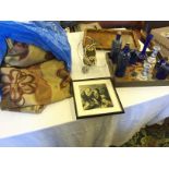 A selection of blue glass, a painted tea tray and a set of curtains.