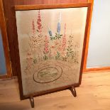 *An embroidered fire screen.