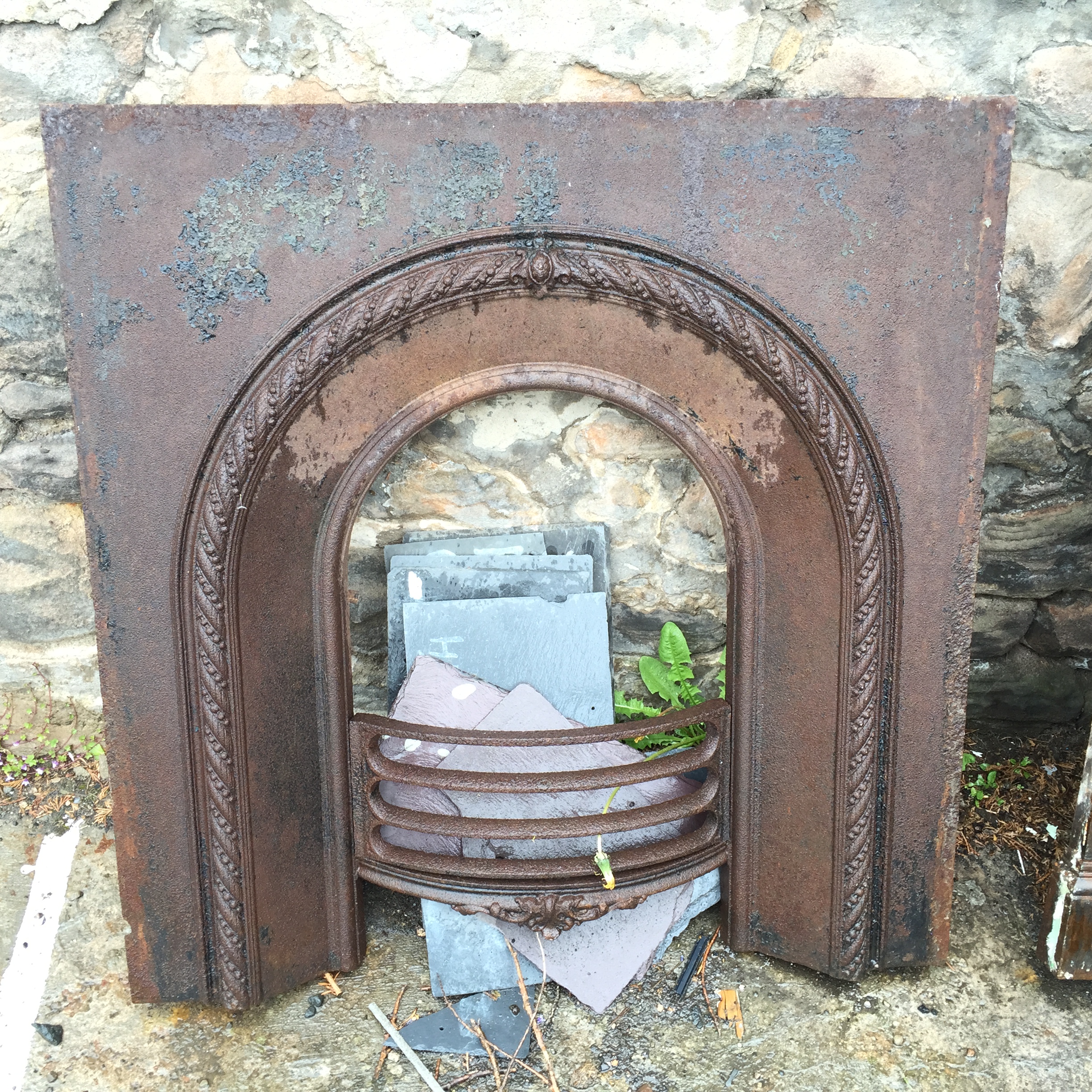 A Victorian cast iron fire place.