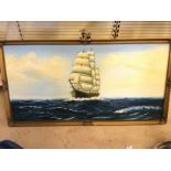 A large oil on canvas of a tall ship signed Johnson.