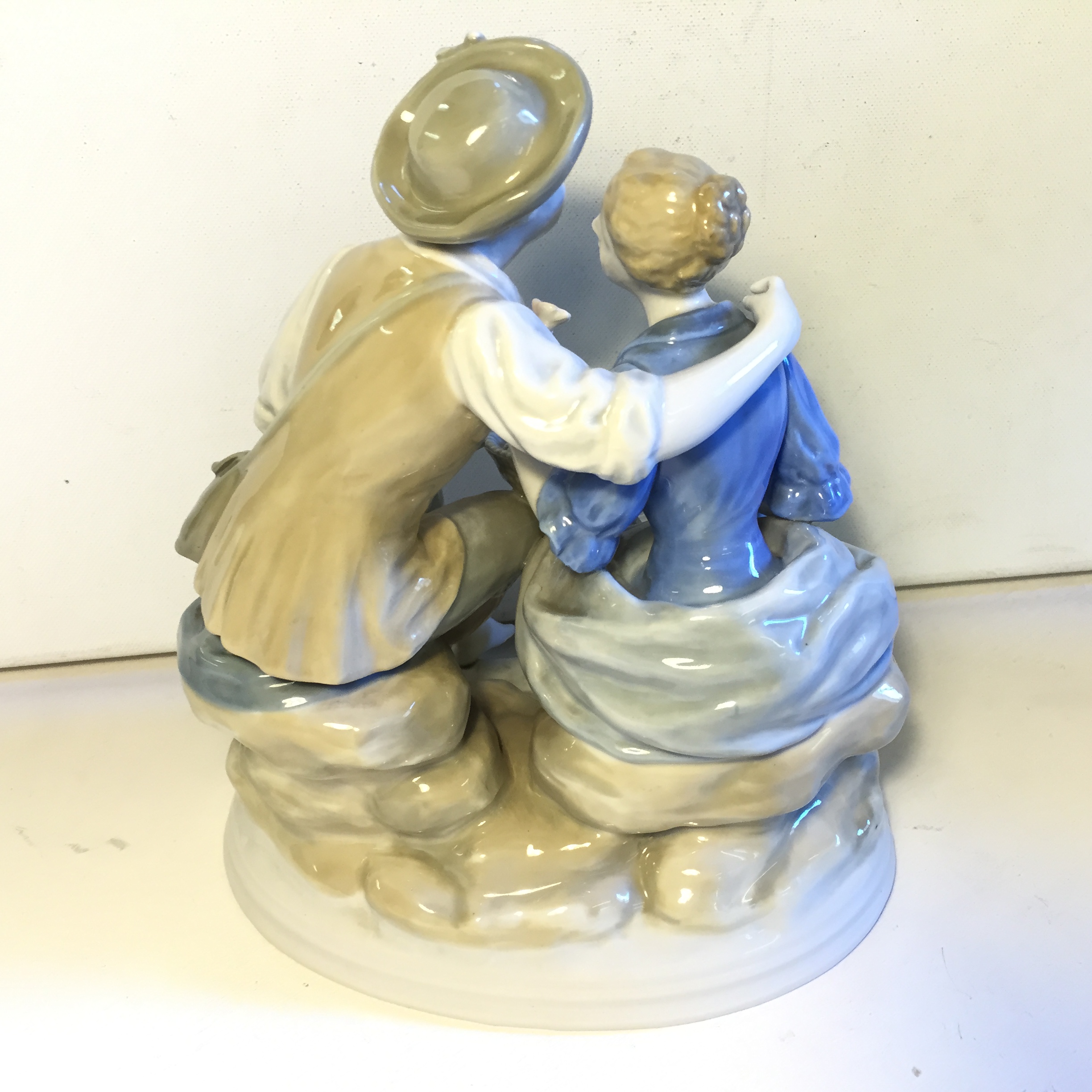 A Spanish figurine of a couple seated. - Image 3 of 5