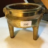 A Chinese brass censer with markings which read Made during the Xuande reign.