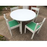 *A designer by dinette 70's table and chairs.