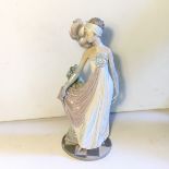 A lladro figurine of a girl.