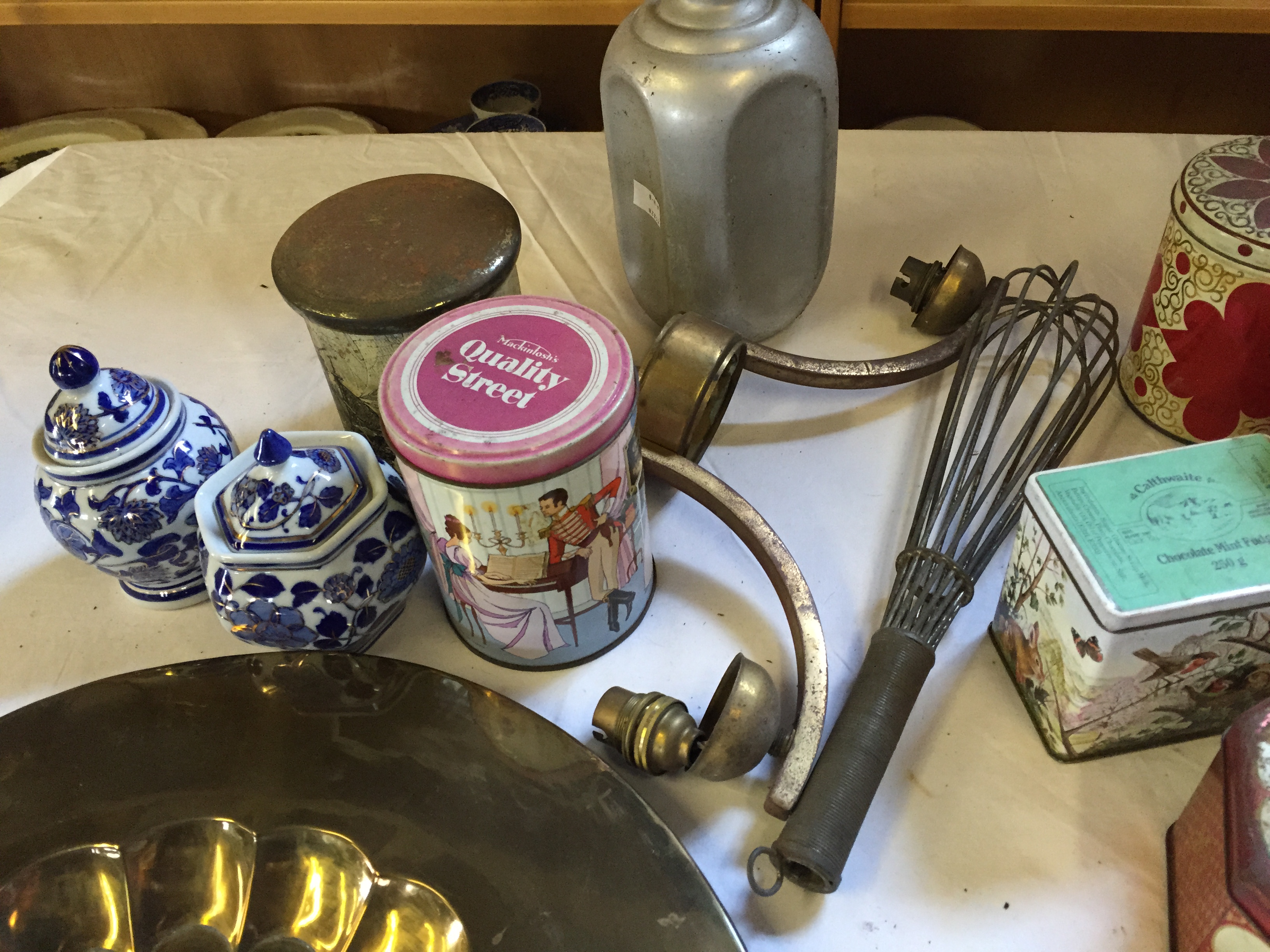 A mixture of items including tins and a brass plate. - Image 3 of 4