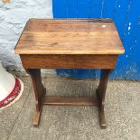 An oak school desk.