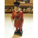 A Carltonware handpainted Beefeater Yeoman Decanter (empty)
