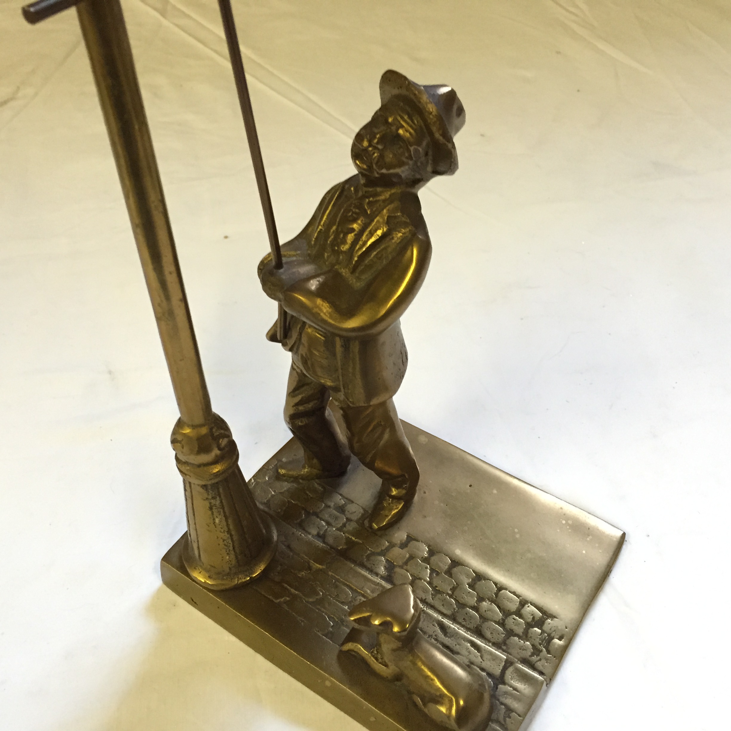 A brass lamplighter figure. - Image 2 of 2