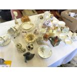 A varied selection of ceramics including novelty tea pots