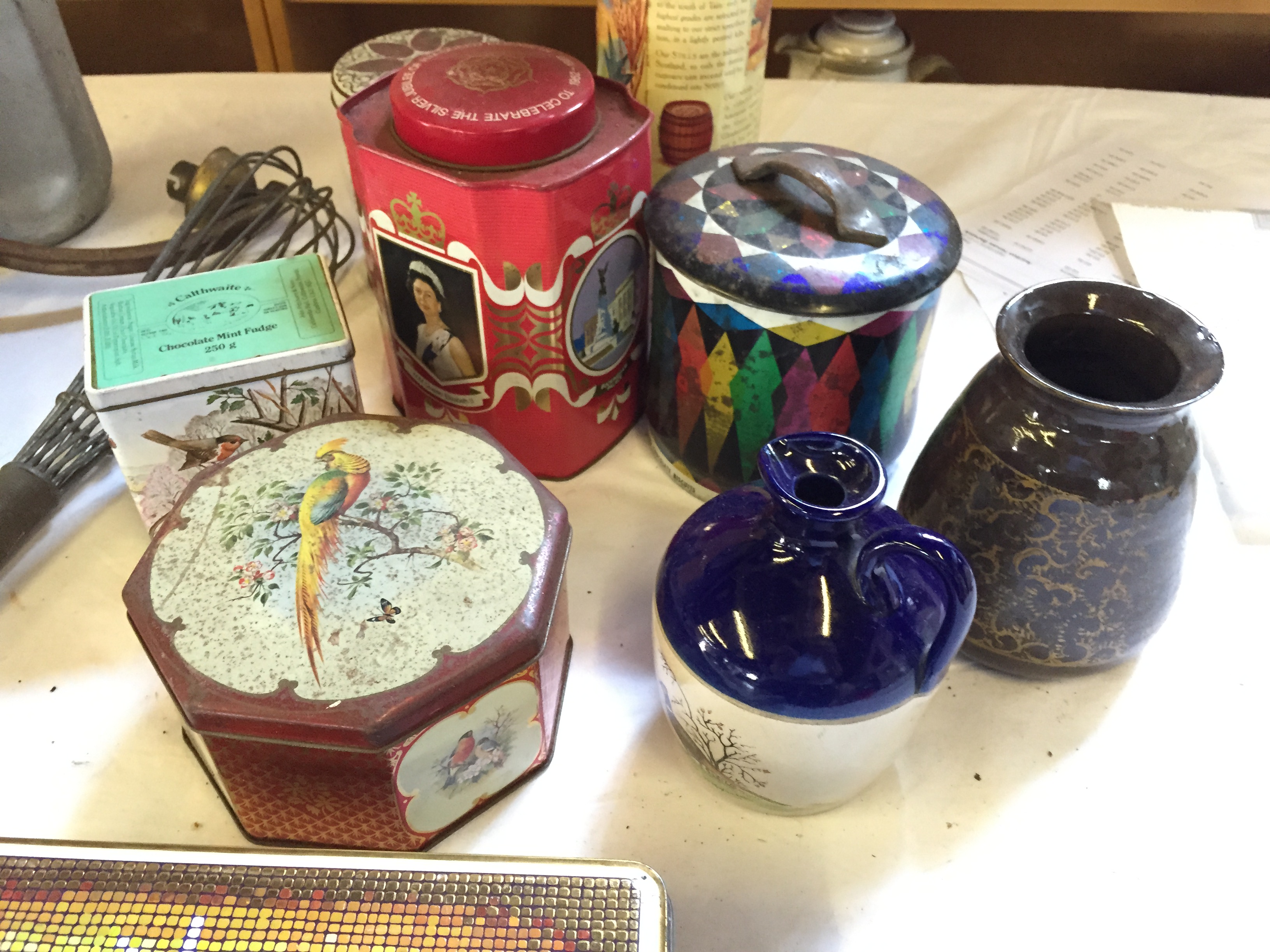 A mixture of items including tins and a brass plate. - Image 2 of 4