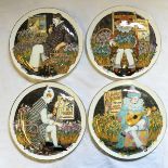 Four Royal Doulton "Behind The Mask" collectors plates.