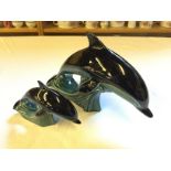 Two Poole Pottery Dolphins 180 mm and 110 mm high.