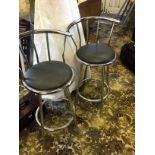 *Two chrome bar stools.