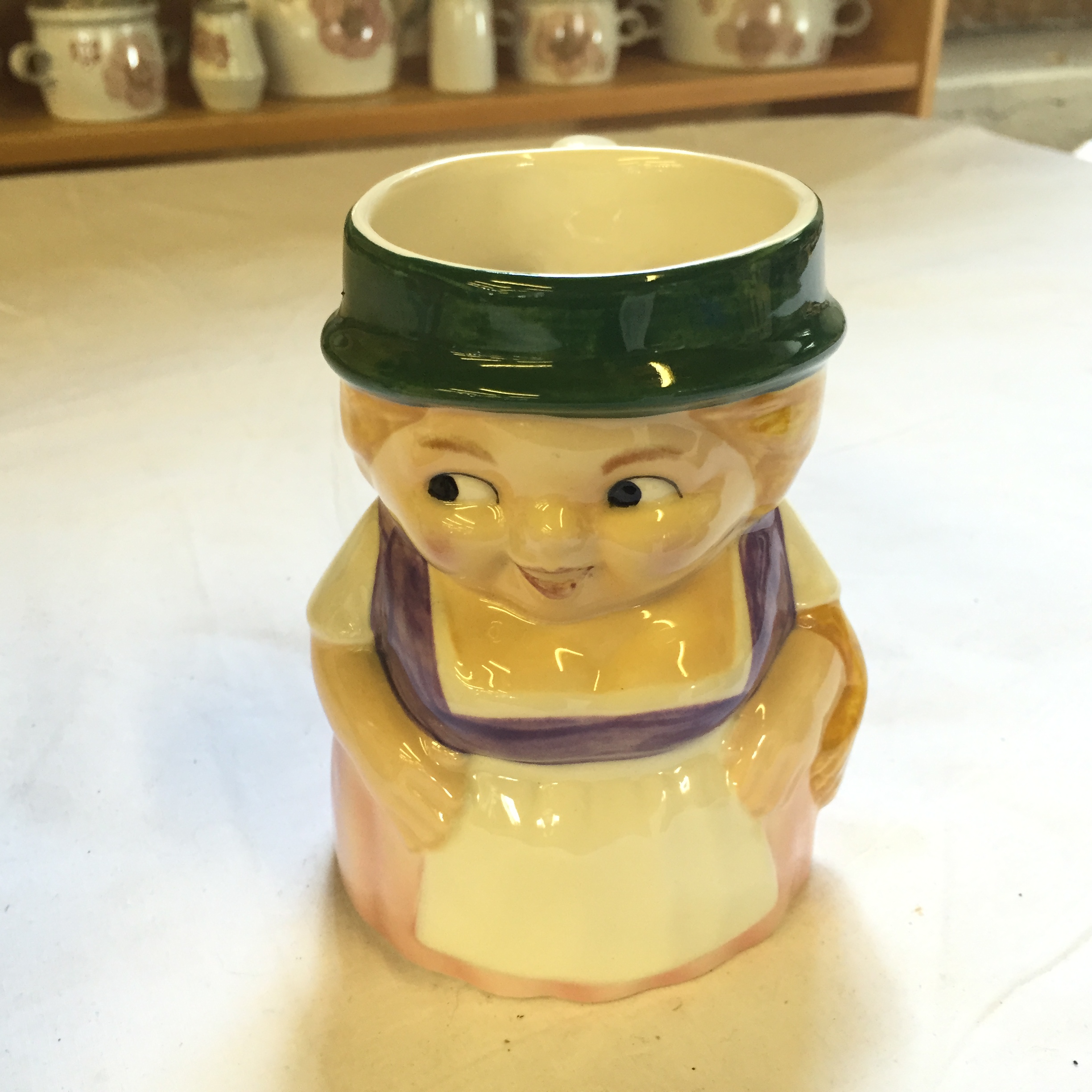 Two Goebel tankards a Shorrter and Son tea pot and a Sandland Toby Jug with cracked handle. - Image 2 of 9