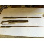 A selection of fishing rods including Al