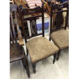 A set of four Victorian oak dining chair