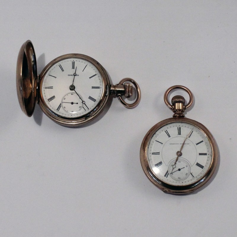 Taschenuhren - Konvolut2 St., vergold., 1x Cheshire, 1x Hampden Watch Co., Emailzifferblatt, besch.,