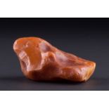 Naturbernstein/ Natural Amber  butterscotch, ca. 7,3 cm x 5,6 cm x 4 cm, Gewicht ca. 72 g./