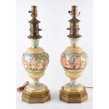 Paar Tischlampen um 1880 / Pair of table lamps, about 1880Porzellan mit Bronzemontierung,