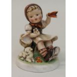 Hummelfigur"Auf Wiedersehen", am Boden gemarkt, wohl um 1920, H. 12 cmMindestpreis: 150 EUR