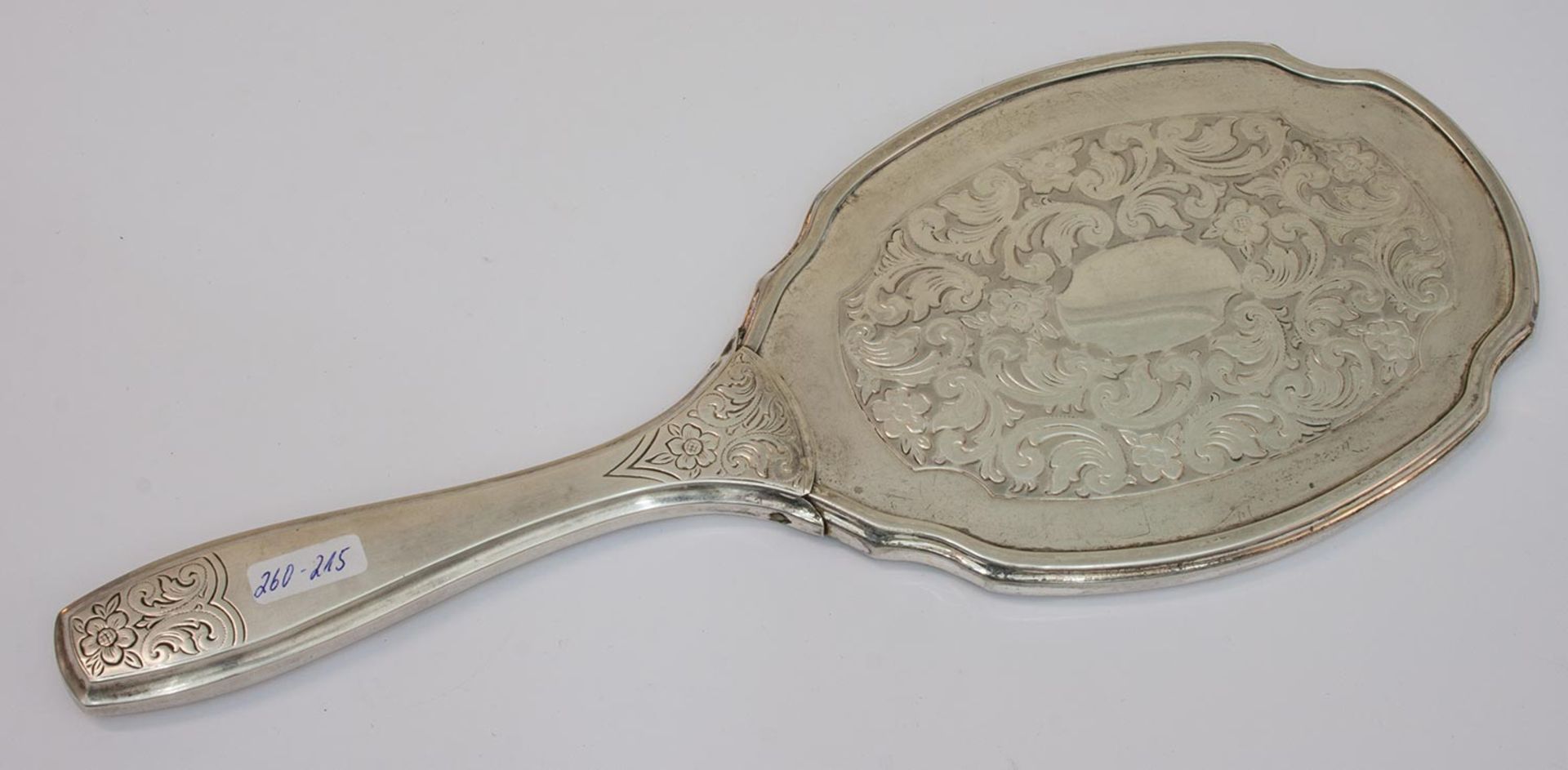 Handspiegelum 1920er Jahre, 835er Silber mit ziseliertem Rocaillendekor, L. 28 cmMindestpreis: 60