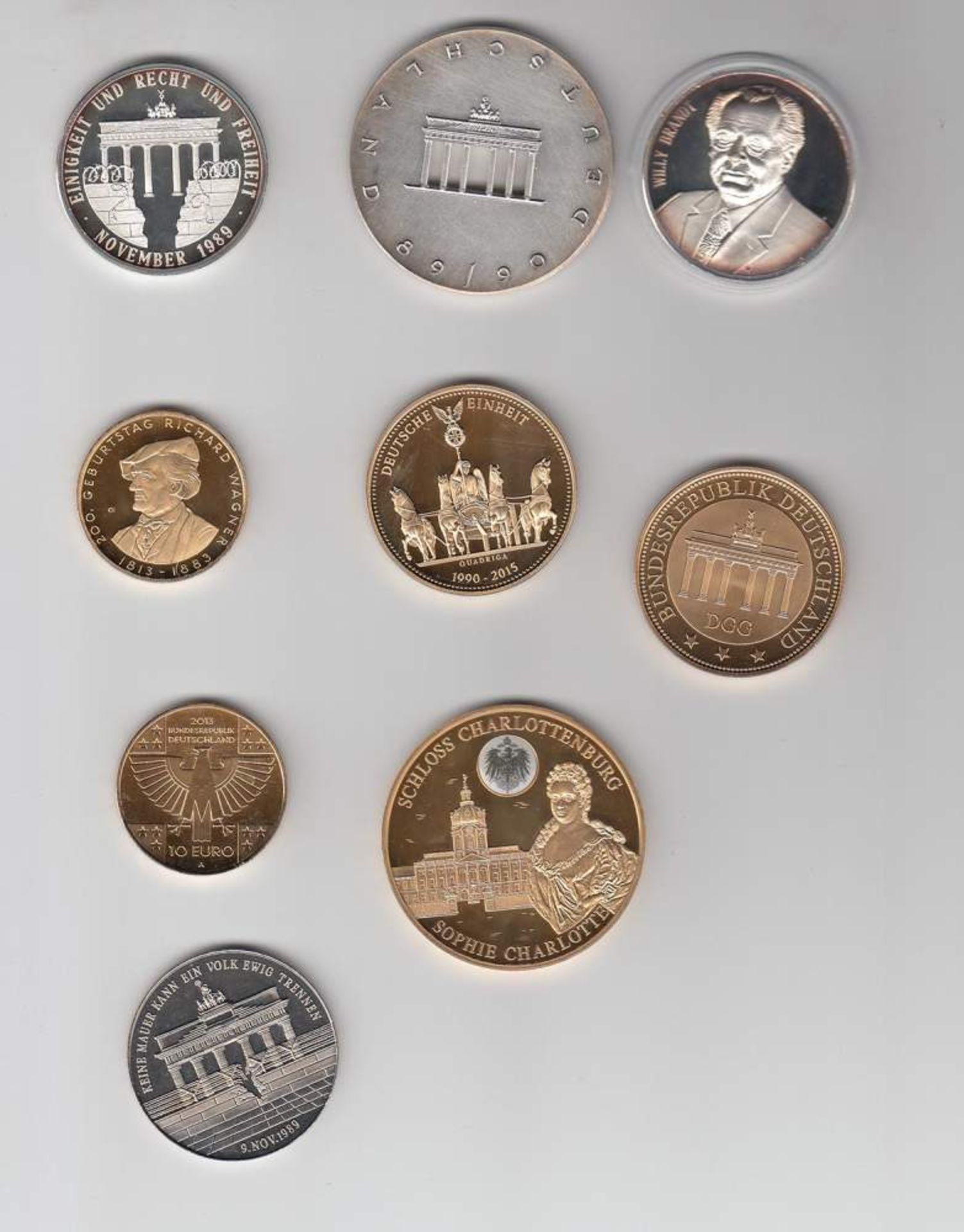 Posten Münzen/ Medaillen9 Stck., z.T. Silber, sowie 2 x 10 Euro vergoldetAufrufpreis: 40 EUR
