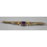 Goldbrosche Amethyst
1960er Jahre, Gelbgold gestempelt 585, besetzt mit einem Amethystcaree, L 6 cm,