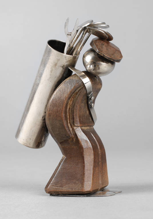 Figürlicher Bowlespießhalter  
um 1950, Holz geschnitzt mit verchromter Metallmontierung, kleiner