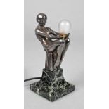Figürliche Tischlampe Max le Verrier
Frankreich, um 1930, signiert Max le Verrier, Metallguss