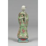 SCULPTURE IN POLYCHROME GLAZE PORCELAIN , CHINA END XVIII, BEGINNING XIX CENTURY depicting Lan Caihe