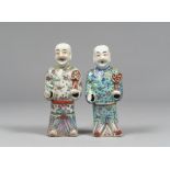 PAIR OF SCULPTURES IN A POLYCHROME GLAZE PORCELAIN , CHINA 19TH CENTURY depicting two young people