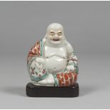 SCULPTURE IN POLYCHROME, GLAZE PORCELAIN CHINA 19TH CENTURY Budai portrait depicting the classic