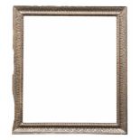 NEAPOLITAN SILVER FRAME, EARLY 20TH CENTURY inner size 69 x 78 cm. Missing parts on one side.